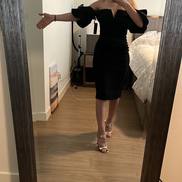 Lulus Dresses & Skirts - Midi black dress with ruffles from Lulu’s